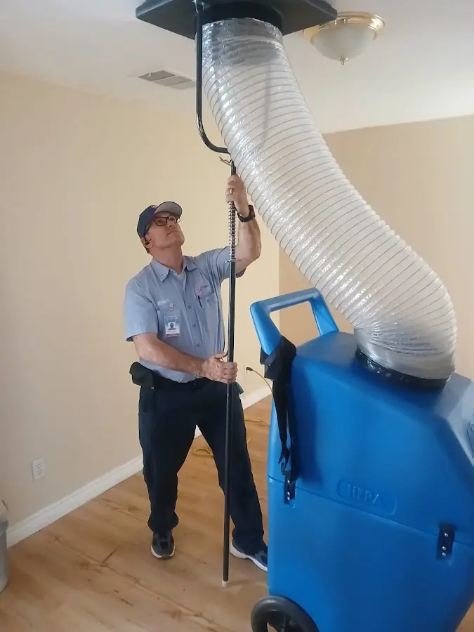 HVAC Installation technician using HEPA equipment in Dacono